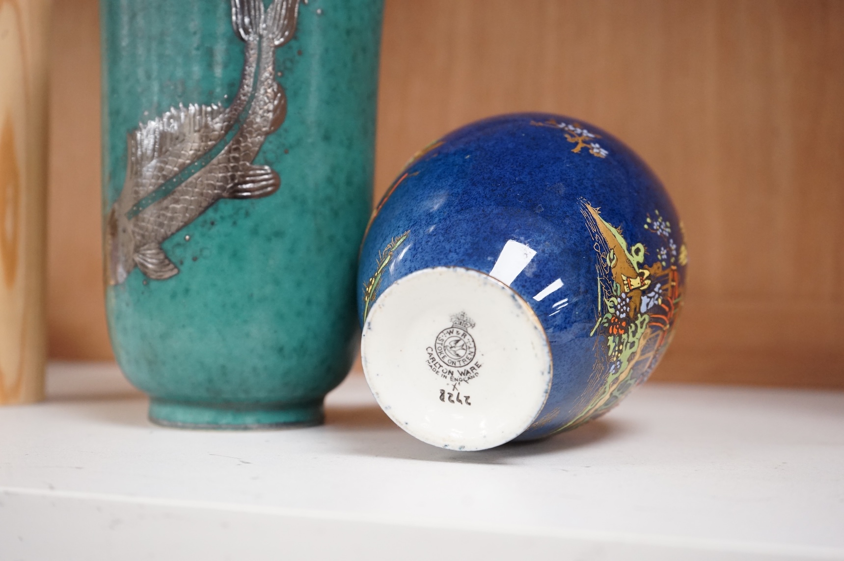 A Gustavsberg Argenta ware vase and a Carlton ware vase, tallest 16.5cm high.
